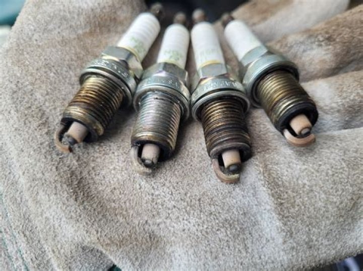 Can bad spark plugs make your car hesitate?
