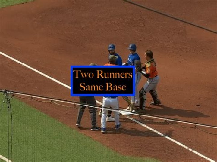 Can two runners be on a base at the same time?
