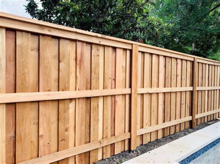 Can you put boards on both sides of a fence?