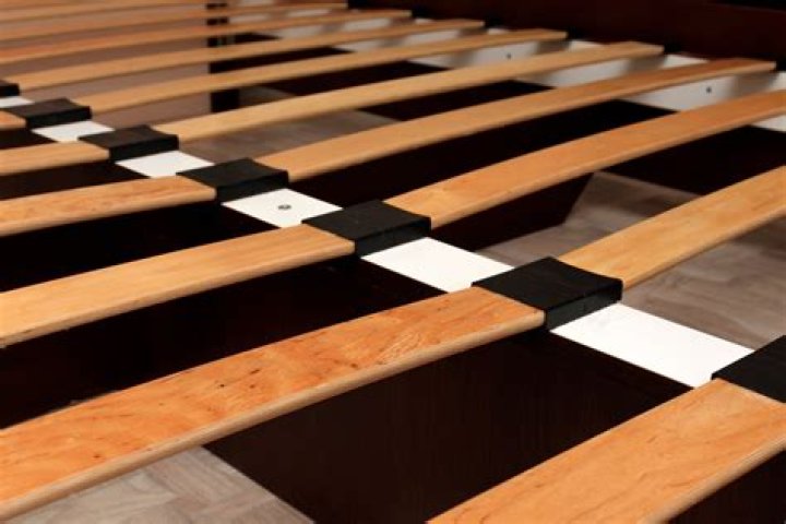 Can you put plywood over bed slats?