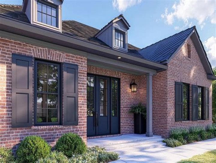 Can you put siding on a brick house?