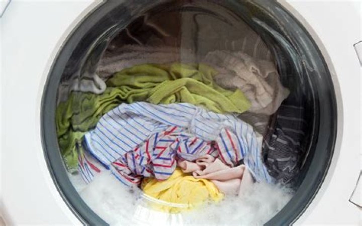 Can you wash moldy clothes in the washer?
