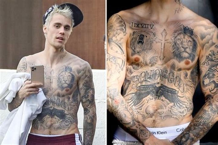 Did Justin Bieber remove his tattoos?
