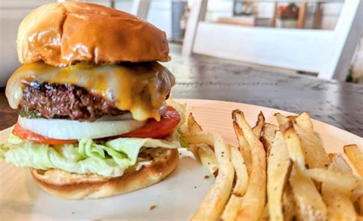 Do Beaches and Cream burgers come with fries?
