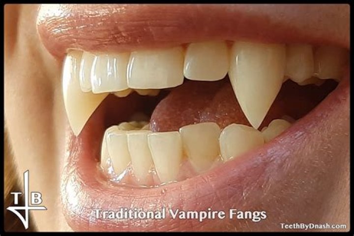 Do Dhampirs have fangs?