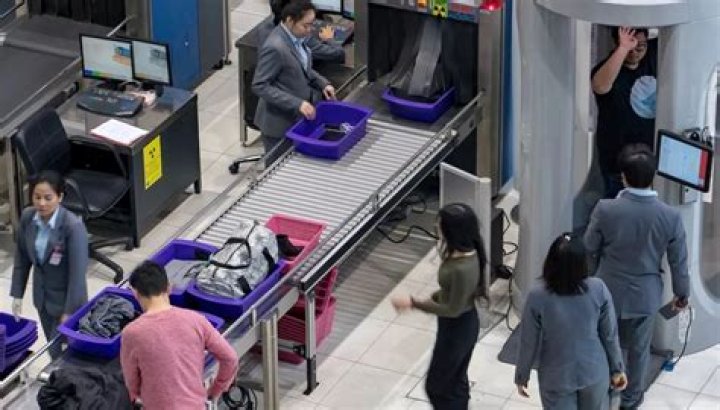 How do airport scanners detect drugs in luggage?
