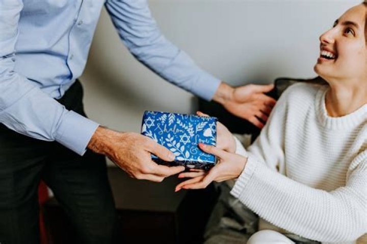How do I give someone a gift card?