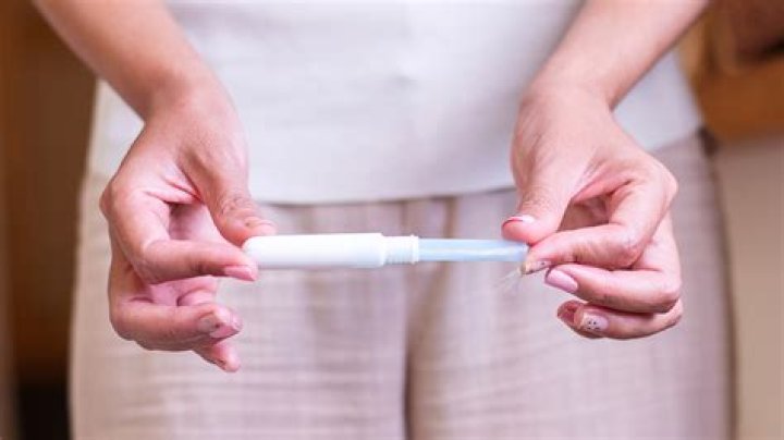 How do you put in a tampon for beginners?