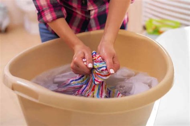 How do you wash heavily soiled clothes?