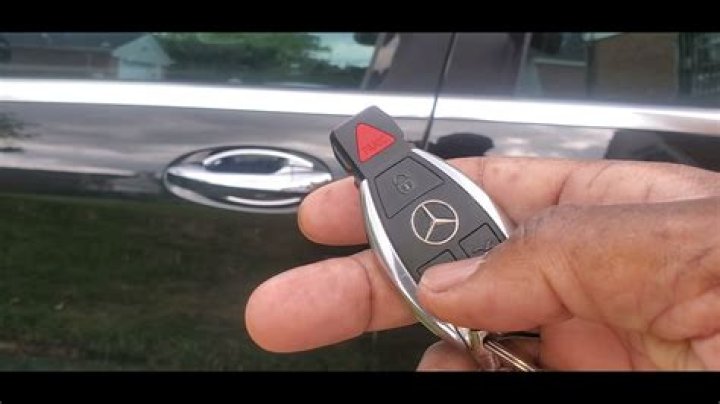 How does a key fob communicate with a car?