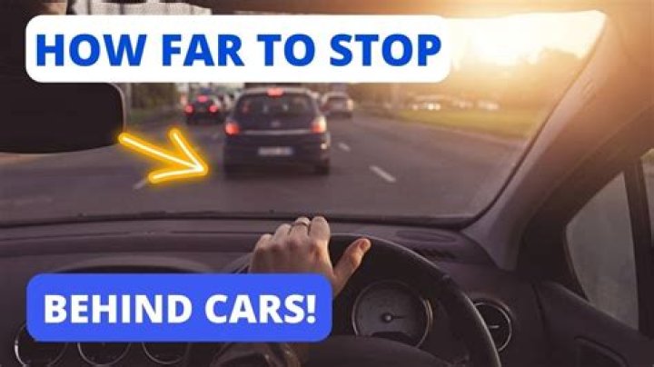 How far should you stay behind a car while driving?