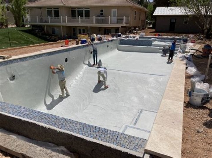How long before you can swim in a newly plastered pool?