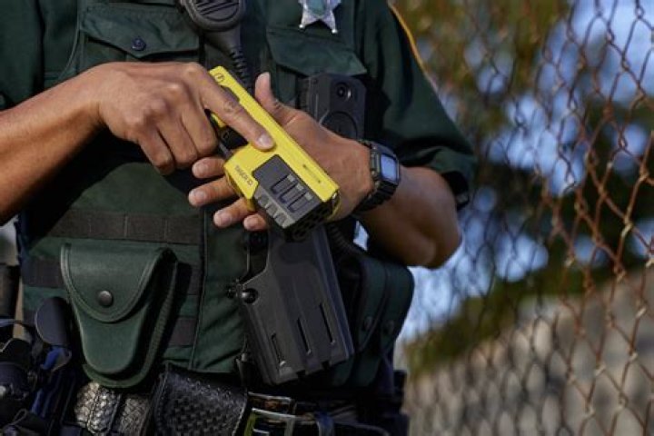 How many Microcoulombs does a police taser have?