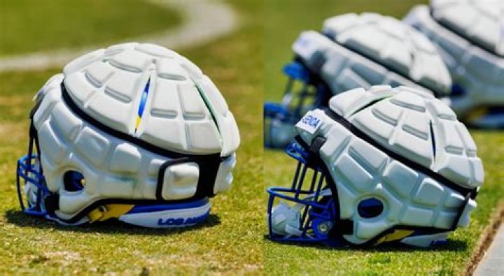 How often are pro football helmets replaced?