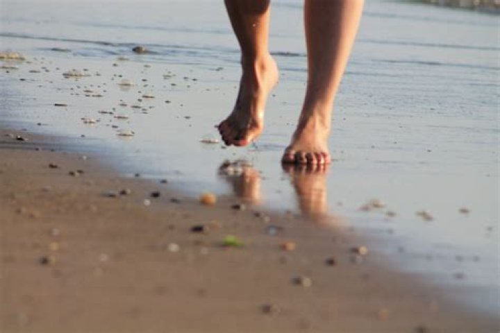 Is running barefoot on the beach good for you?