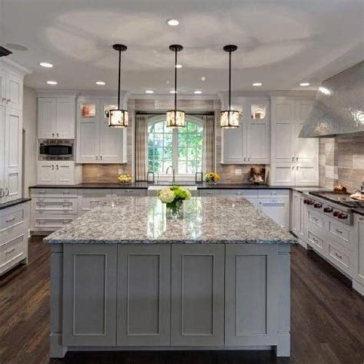 Should kitchen island be different color than cabinets?
