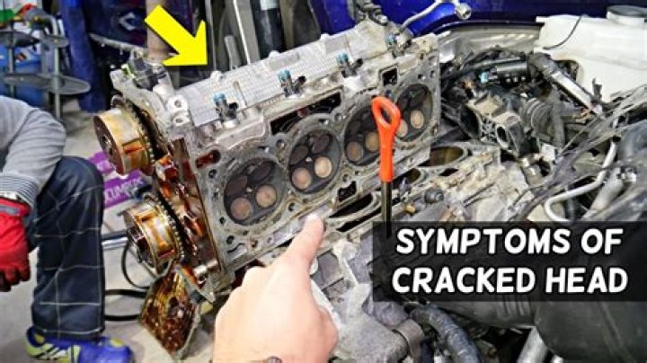 What are the symptoms of a cracked head gasket?