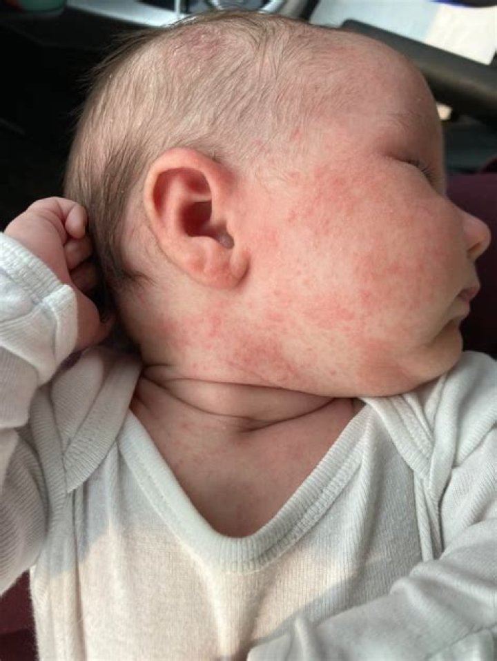 What do you wipe a baby's face with?