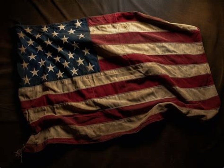 What does an American flag with a green stripe mean?