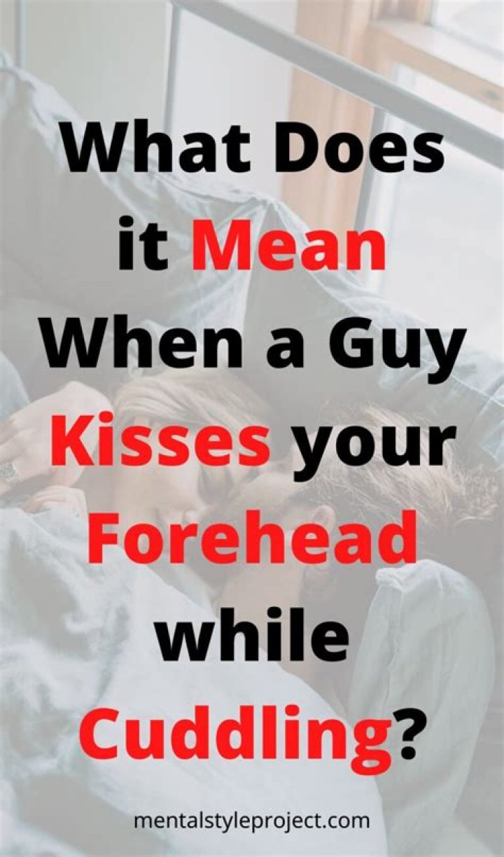 What does it mean when a guy kisses your forehead while cuddling?