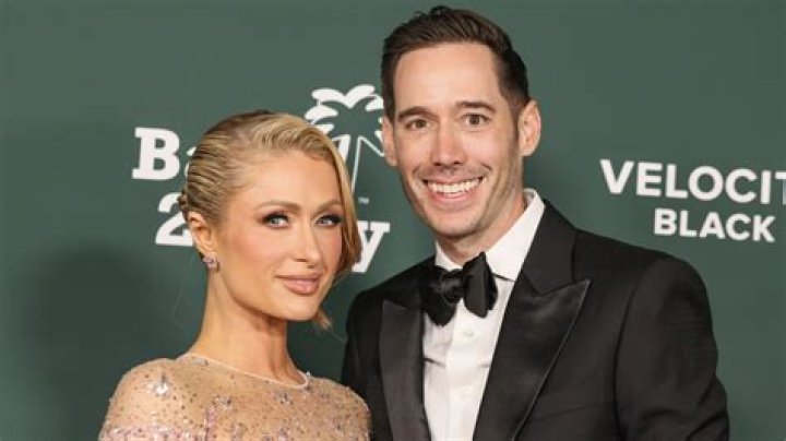 What does Paris Hilton husband do for a living?