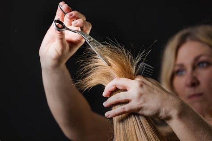 What happens when you rub scissors on your hair?