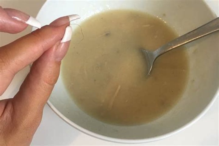 What happens when you swallow hair?