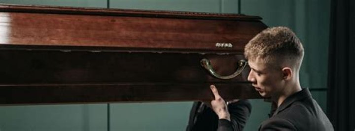 Where do pallbearers sit at a funeral?