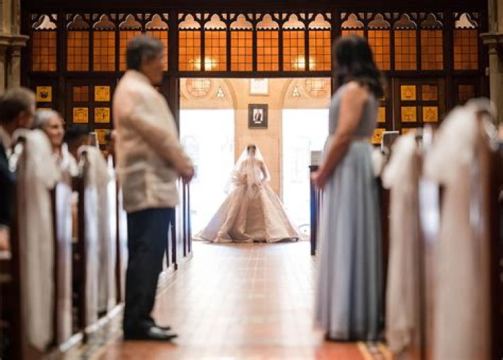 Who walks brides mom down the aisle?