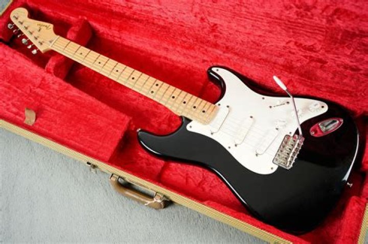 Why did Eric Clapton name his guitar Blackie?