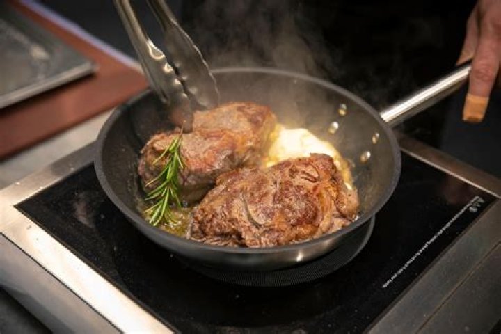 Why do chefs put butter on steak?