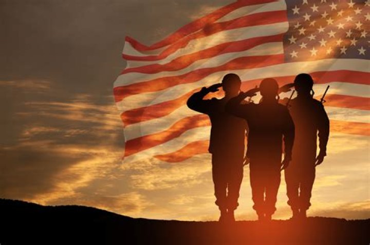 Why do veterans salute during National Anthem?
