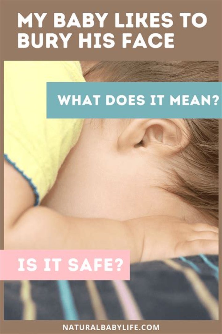 Why does my baby bury his face in my chest?