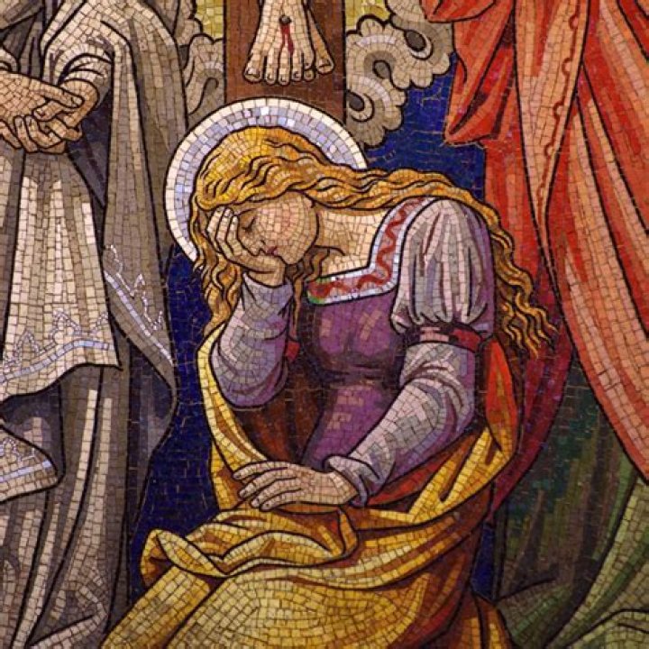 Why is Mary Magdalene depicted with long hair?