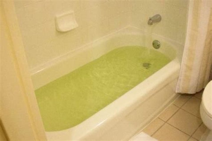 Why is my bath water yellow green?