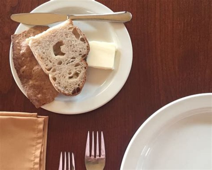 Why is the bread plate on the left?